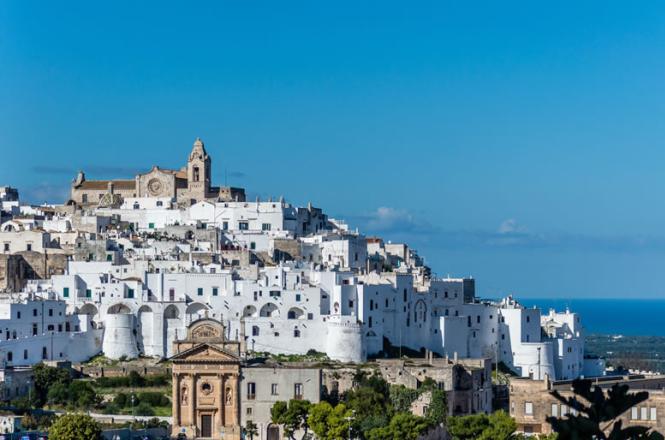  <b>Ostuni</b><br> <br> The well-known “white city” offers an outlandish scenario graced with  lime-painted buildings creating a particular light effect, especially in Summer.  The medieval village enjoys a stunning and scenic view from the hills.